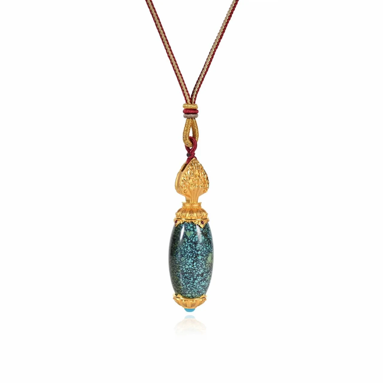 Patterned stone pendant suspended from a red and gold-tone cord.